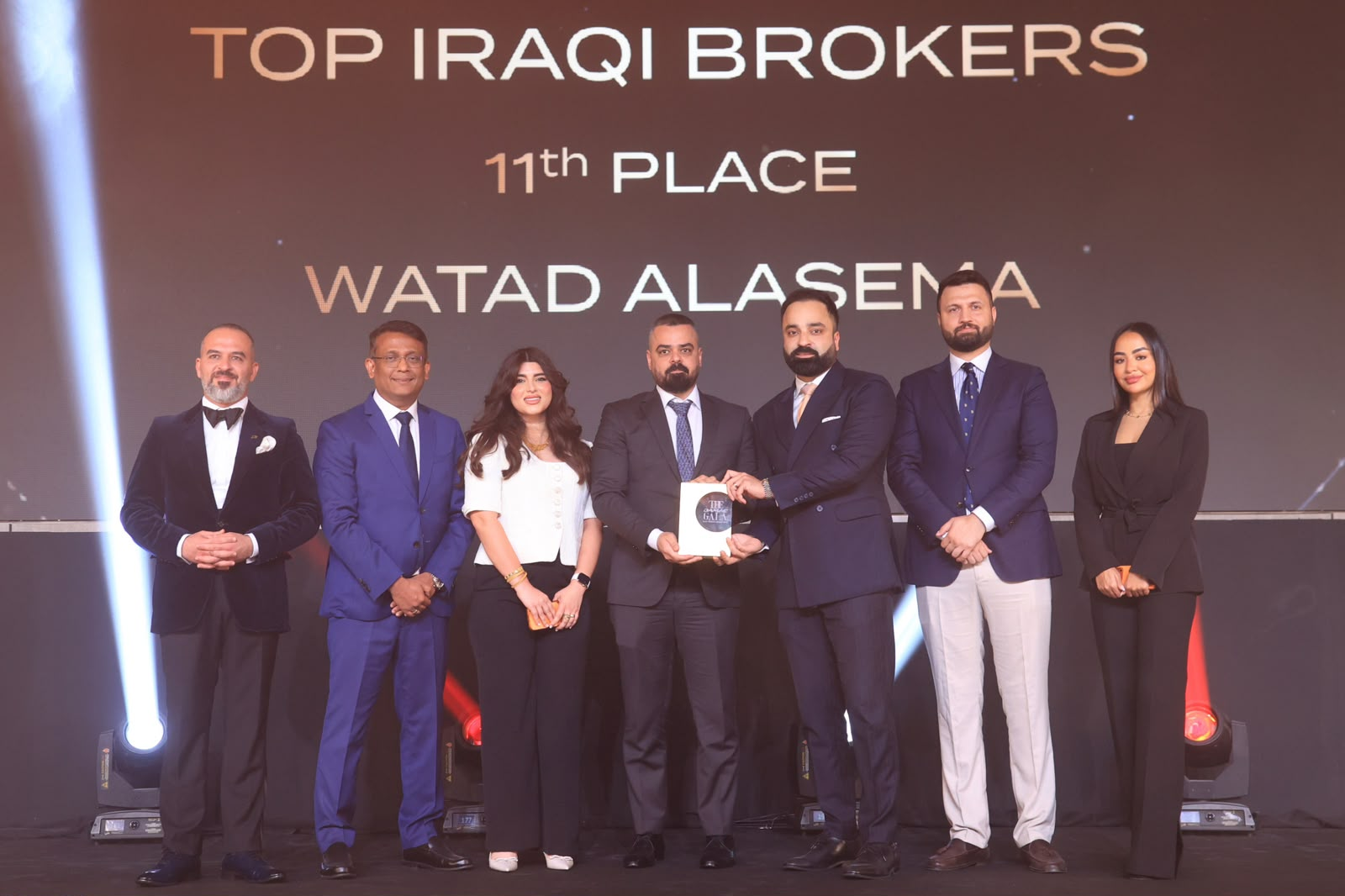 Watad Al-Asema team at the awards ceremony